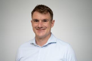 Portraitaufnahme von Dr. Florian Grafl
